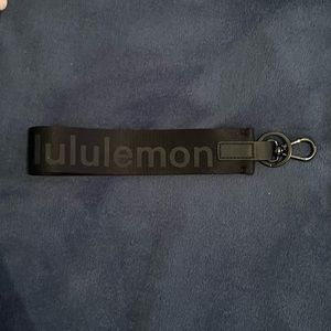 Lululemon black never lost key chain